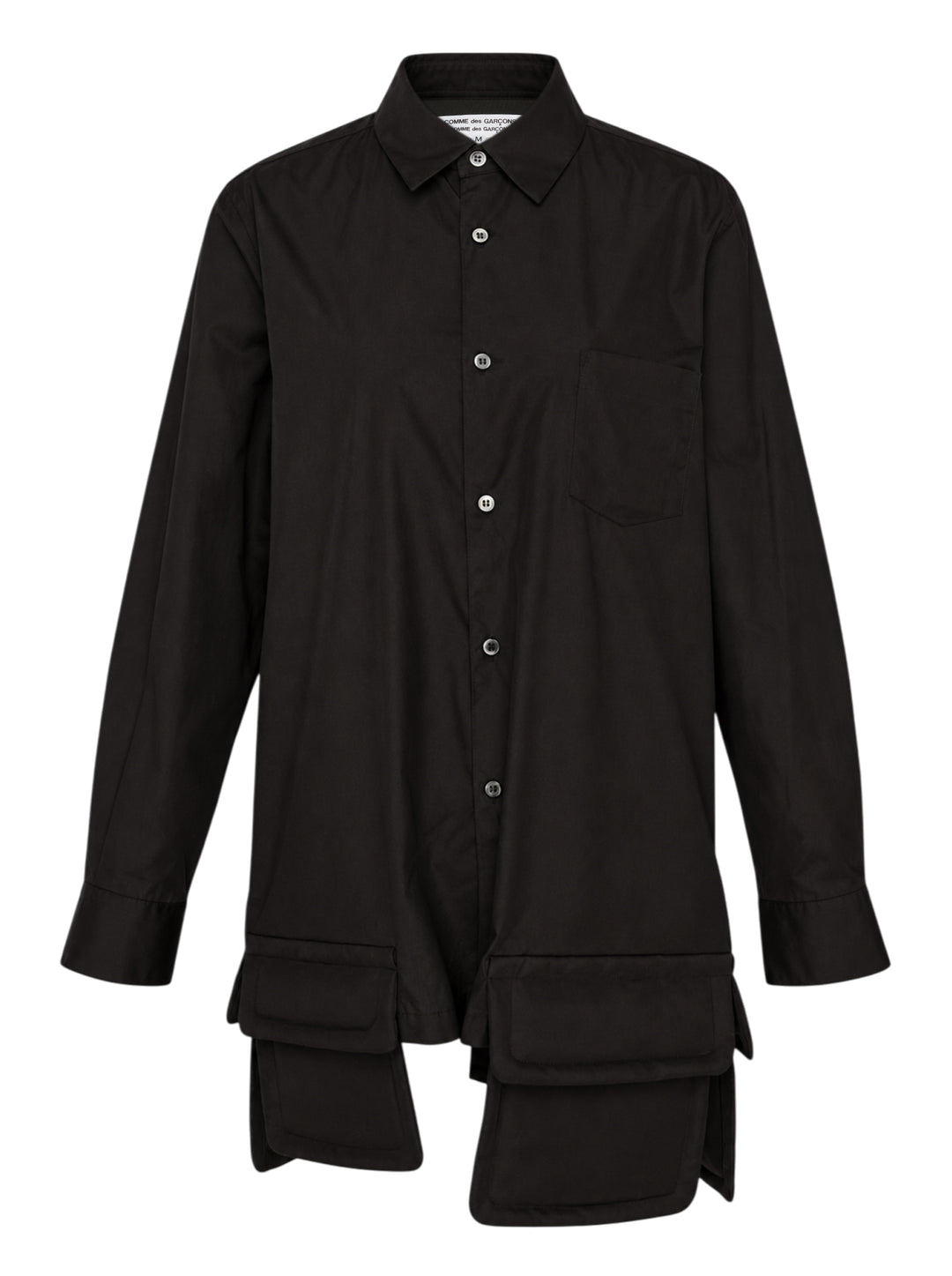 Black long sleeve shirt with asymmetric hem and padded flap pockets by Comme des Garçons Comme des Garçons