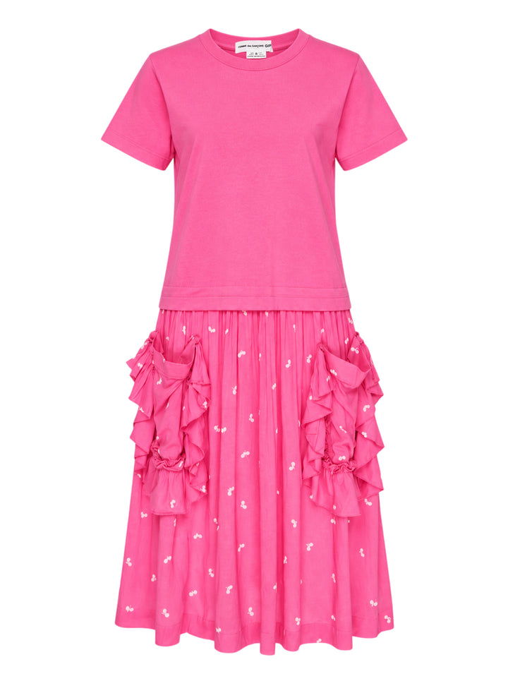 Comme des Garçons Girl pink dress with a short-sleeve jersey tee top and a gathered cherry-print skirt with ruffled pockets