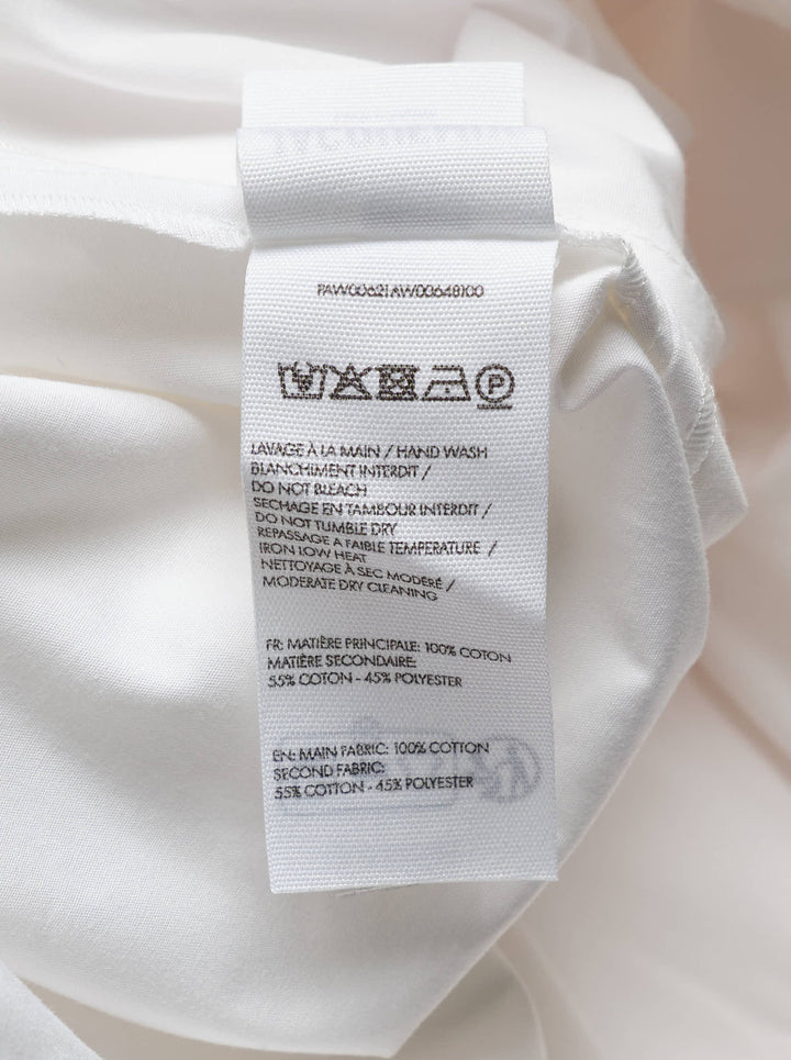 Jacquemus white wide-leg pleated trousers shown from the front against a plain white background - view 3