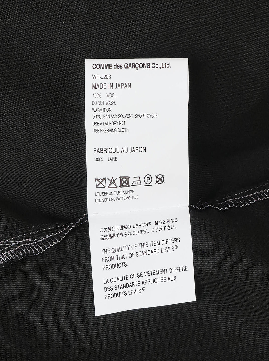 Junya Watanabe x Levi's black long-sleeve shirt with white contrast stitching, embroidered seagull motif across the chest, asymmetric chest pocket with red Levi's tab, and zip-detailed cuffs - view 3