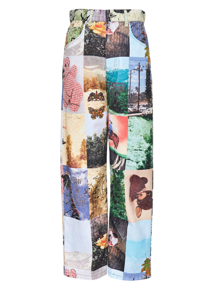 Small Talk Studio jean cut trousers with an all-over photographic patchwork print of teddy bears, butterflies and landscapes