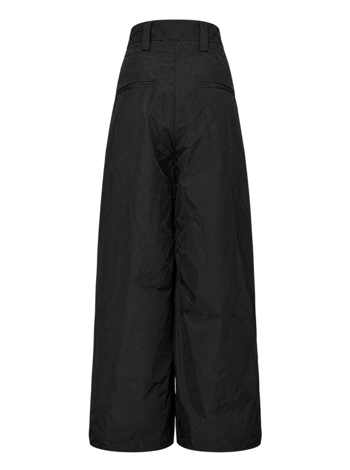 Black high-waisted wide-leg cargo tailored trousers with ruched sculpted pockets and a crinkled finish, shown from the front - view 2