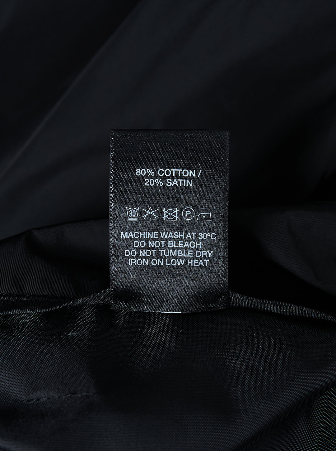 Black high-waisted wide-leg cargo tailored trousers with ruched sculpted pockets and a crinkled finish, shown from the front - view 3