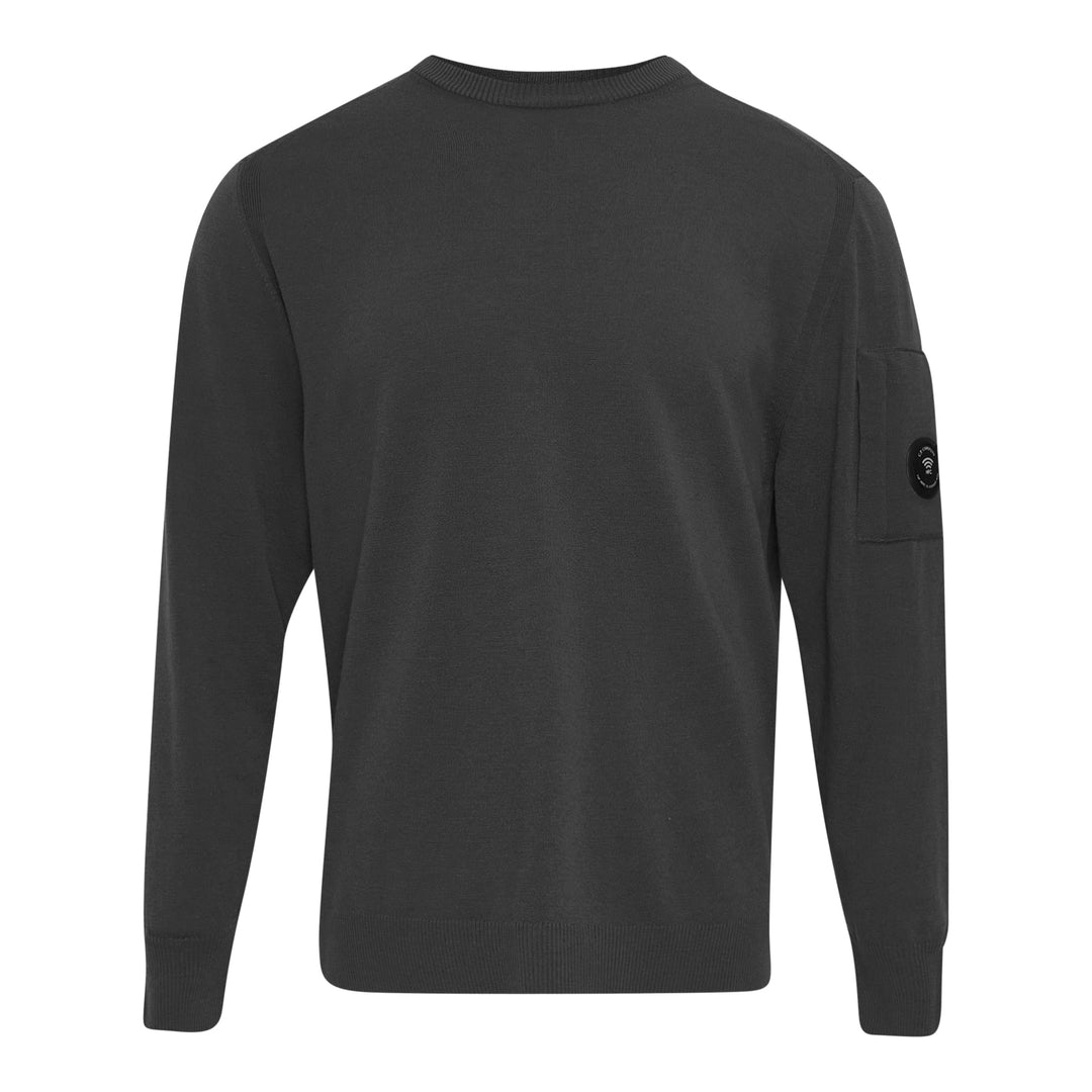 C.P. Company Extrafine Merino Wool Lens Crewneck Sweater in olive green, back view showing sleeve utility pocket and circular lens badge