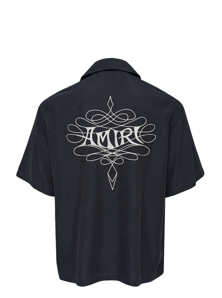 Amiri Lasso oversized camp shirt in black with an ornate embroidered logo on the chest, camp collar and mother-of-pearl buttons - view 2