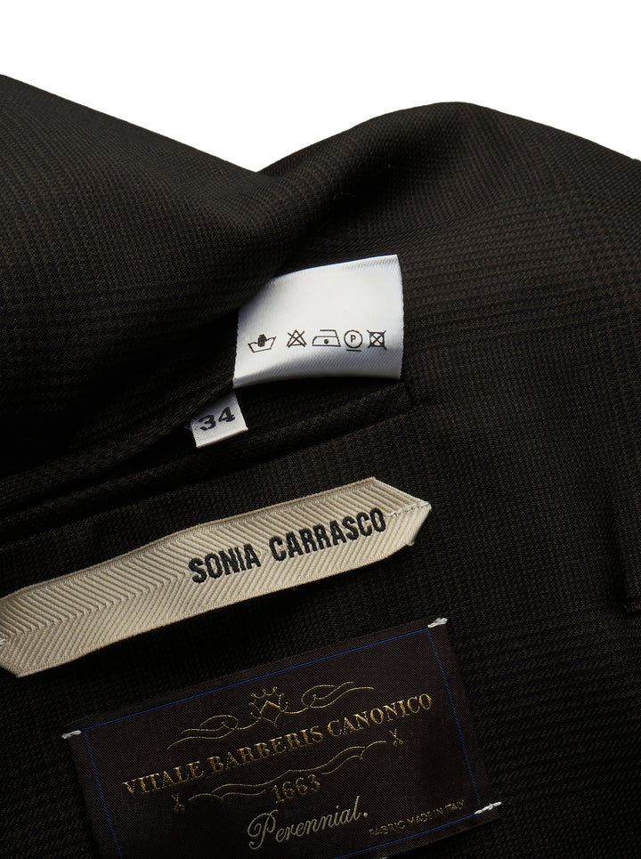 Sonia Carrasco Fundamental Blazer in dark tonal check fabric with white contrast topstitching along lapels and seams, arrow embroidery at shoulders, three antique brass buttons, and patch pockets at hem - view 3