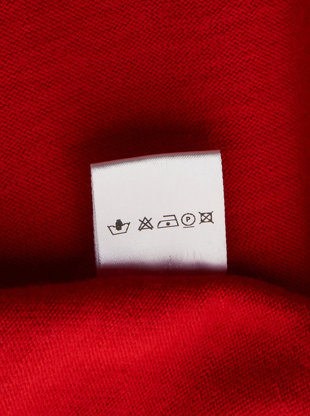 Sonia Carrasco Fitting Knit Vest in red with contrast cream piping along the neckline, armholes, side seams, and front pockets, displayed flat on a white background - view 3