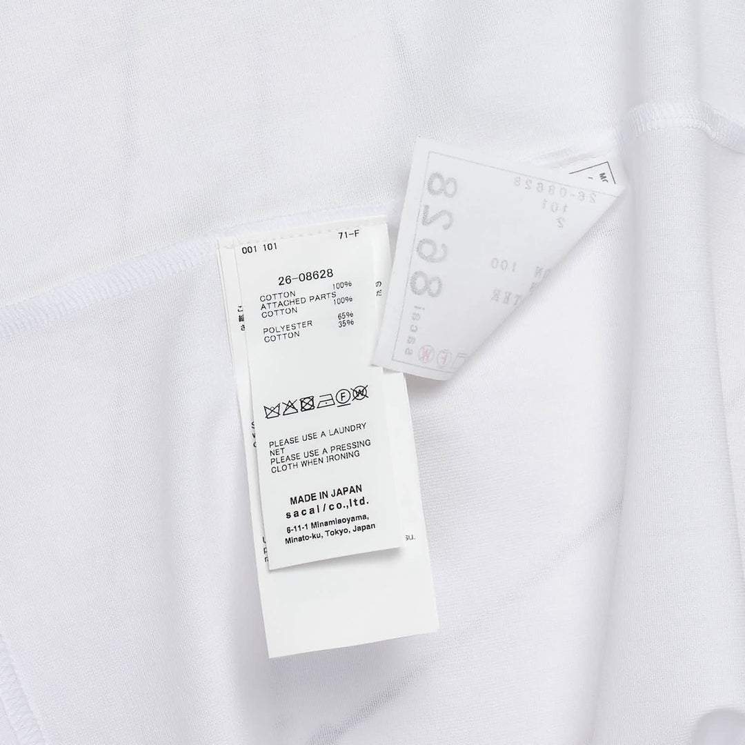 sacai Poplin x Cotton Jersey T-Shirt in white, featuring a boxy silhouette, raglan seaming, and a structured chest patch pocket