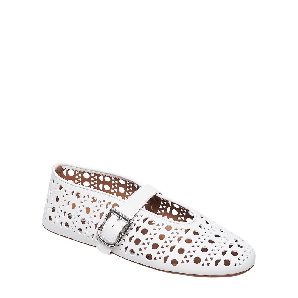 Alaïa Vienne black perforated leather ballet flat with geometric cutout pattern and silver buckle Mary Jane strap, side view