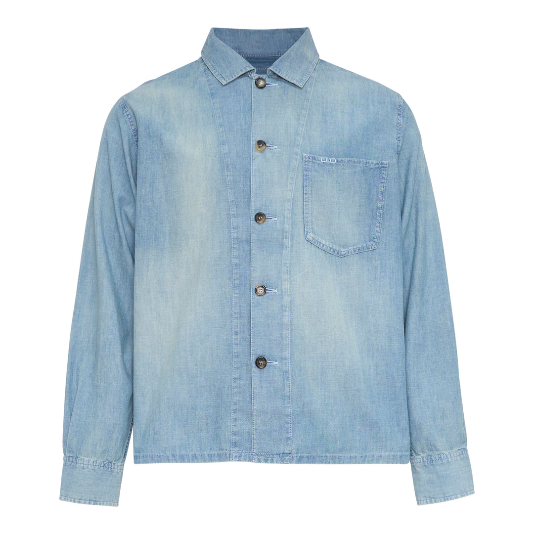 JW Anderson Slant Pocket Chambray Shirt in washed light blue denim, featuring a point collar, button-front closure, and a patch chest pocket