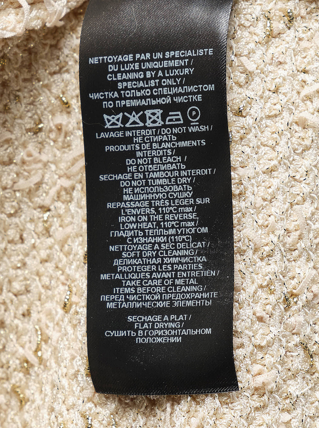 Balmain cream tweed knit mini skirt with gold metallic flecks and two flap pockets with embossed gold-tone buttons - view 4