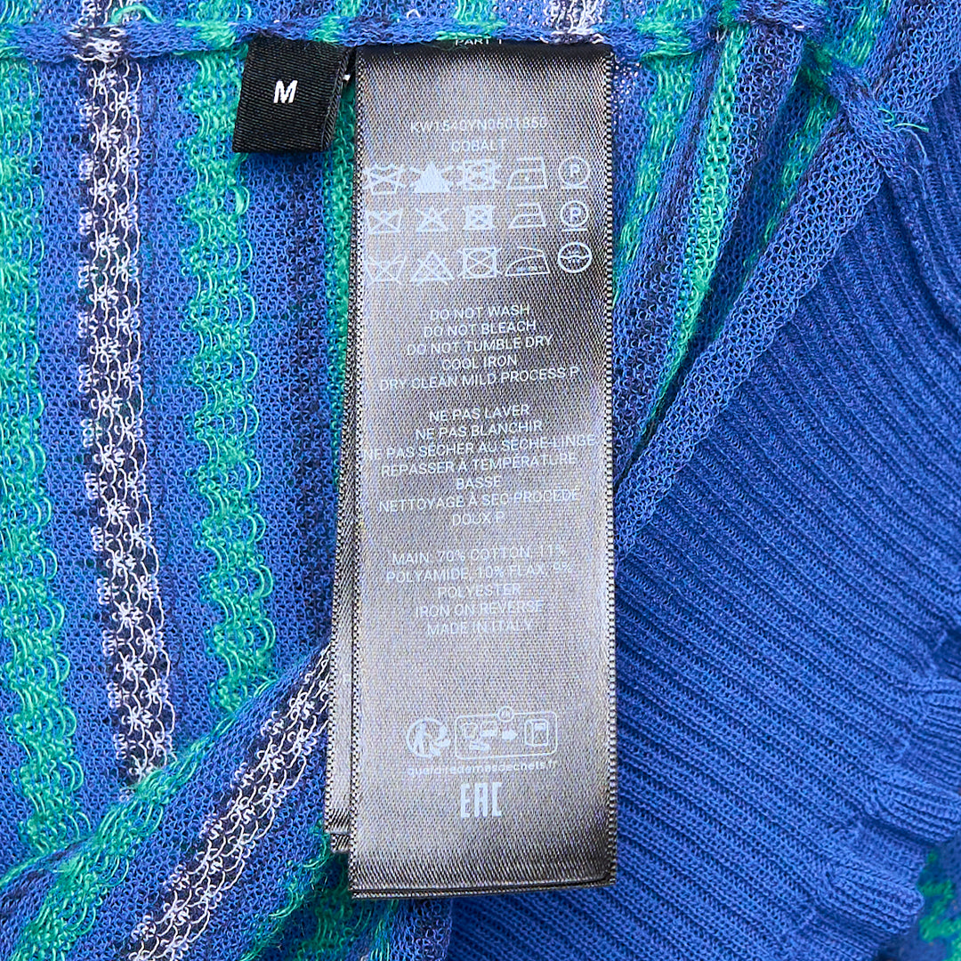 JW Anderson Short Sleeve Sheer Fair Isle Top in blue with green zigzag stripe stitching, open-mesh knit construction, frilled cuffs and double frilled hem, photographed flat on white background