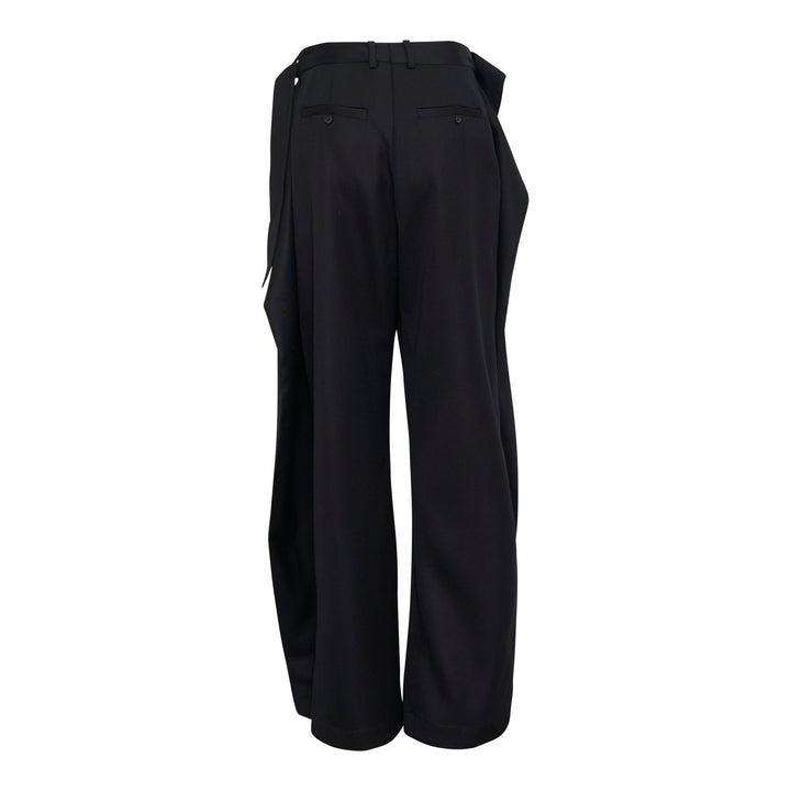 JW Anderson black fold over wide-leg trousers with draped waistband and side zip fastening, cropped length, shown on white background