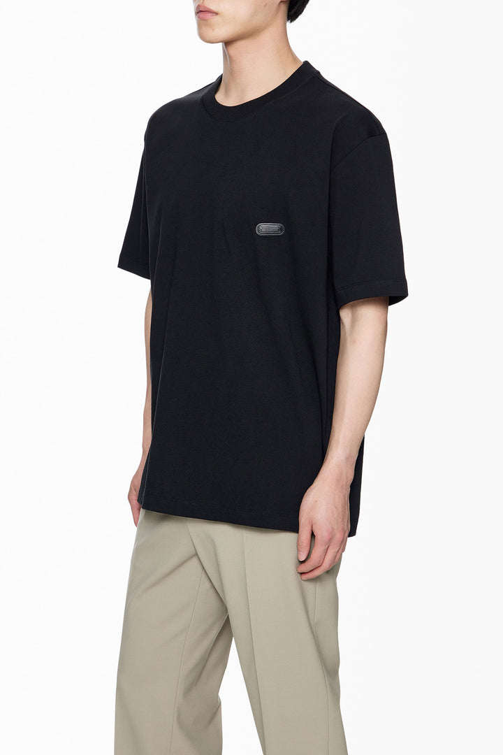 Solid Homme Architecture Short Sleeve Tee in black with gold embroidered Wooyoungmi Paris logo on the chest, oversized fit, crewneck collar, white background - view 5