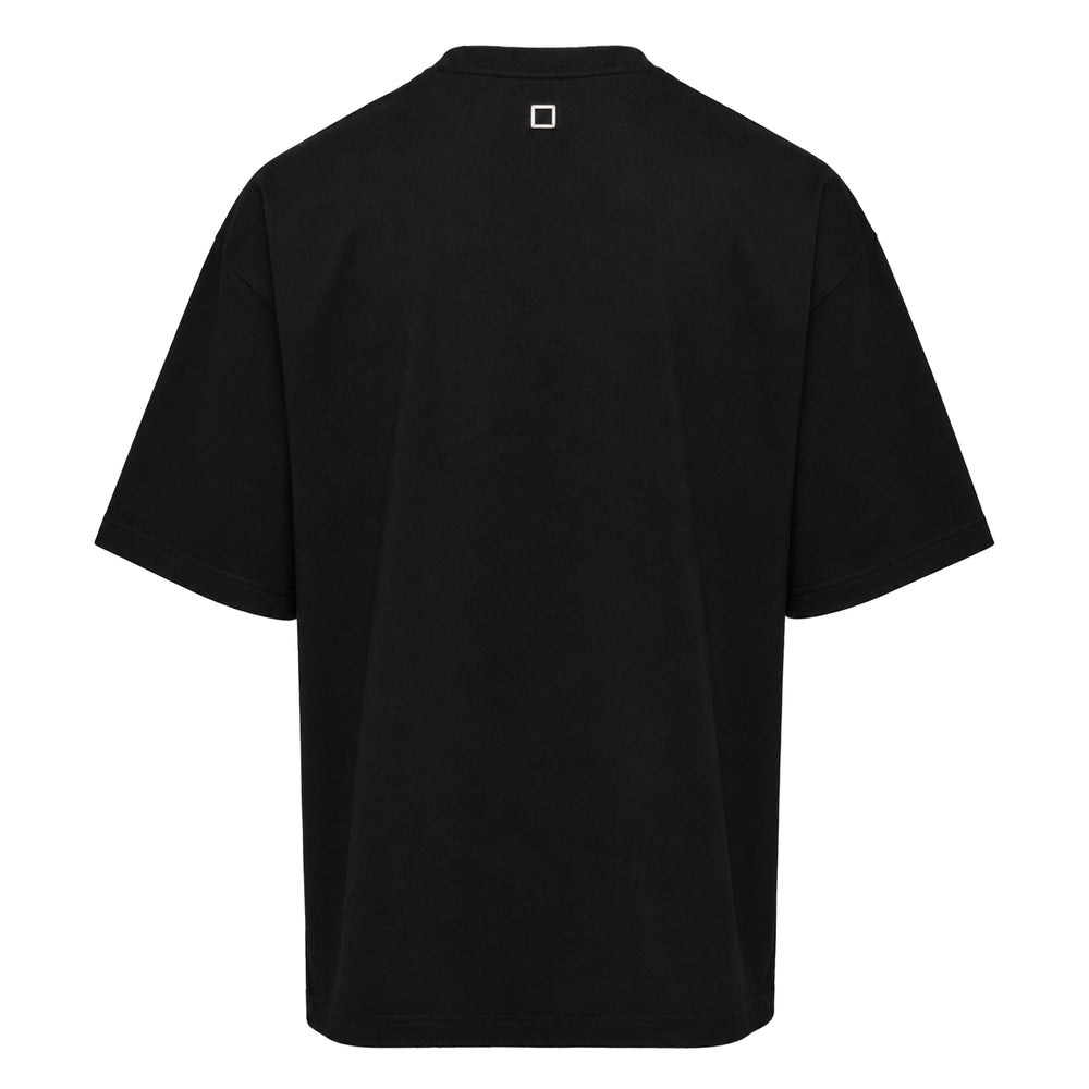 Wooyoungmi Oversized Front Square Embroidered Tee in black, featuring a tone-on-tone embroidered square logo and brand wordmark at the chest, with a relaxed dropped-shoulder silhouette