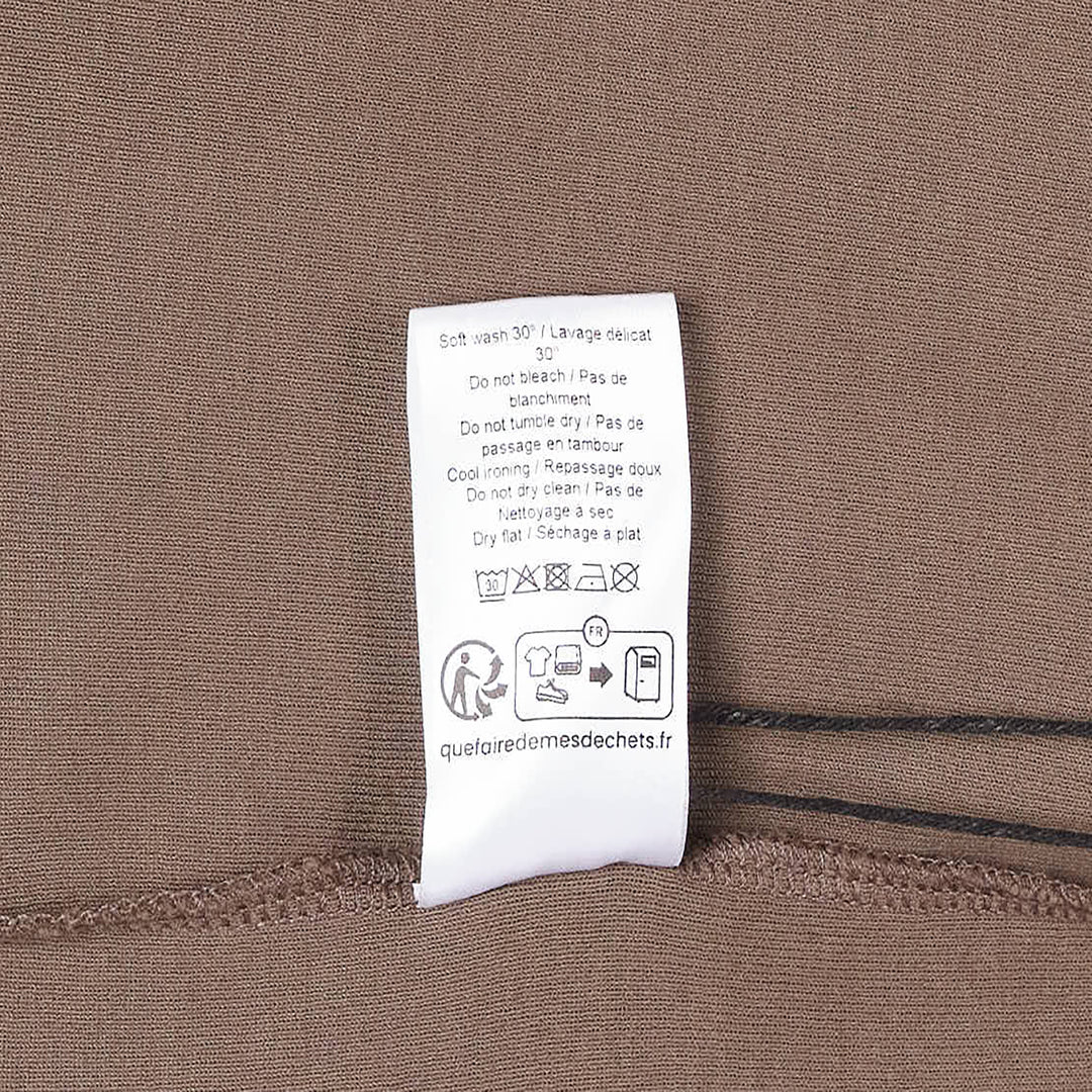 Lemaire Rib Jersey T-Shirt in warm taupe brown, featuring an oversized silhouette, dropped shoulders, and ribbed crew neckline, displayed flat on a white background