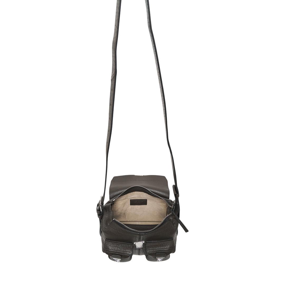 Lemaire Mini Soft Gear Bag in black pebbled leather with dual front push-lock pockets, central flap closure, and long adjustable crossbody strap with silver-tone hardware