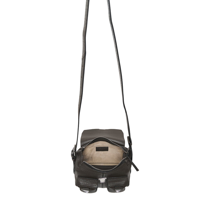 Lemaire Mini Soft Gear Bag in black pebbled leather with dual front push-lock pockets, central flap closure, and long adjustable crossbody strap with silver-tone hardware