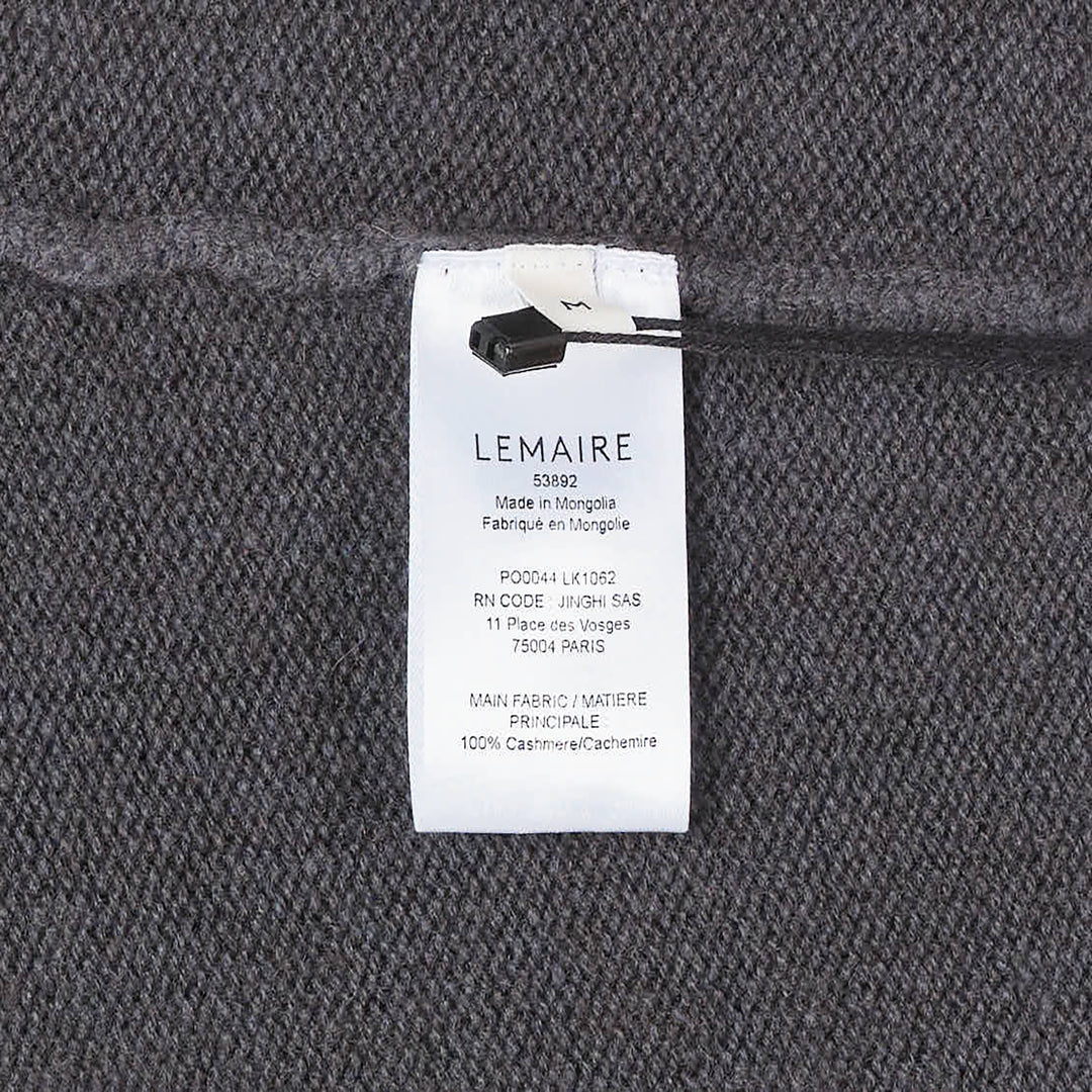 Lemaire Cashmere V-Neck Sweater in slate grey, featuring a ribbed V-neckline, relaxed long-sleeve silhouette, and ribbed cuffs and hem, displayed flat on a white background