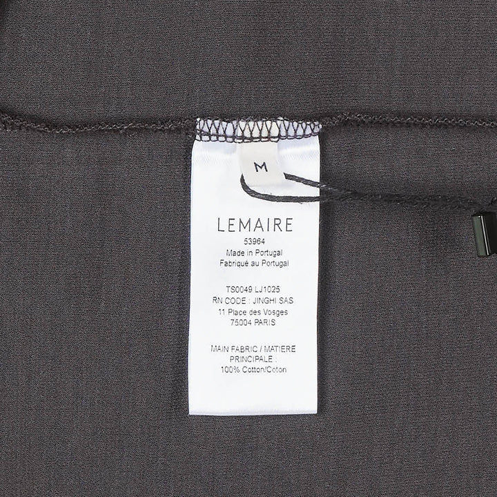Lemaire Long Sleeve Foulard Top in charcoal grey, featuring a softly draped self-tie foulard collar and relaxed A-line silhouette, photographed flat on a white background