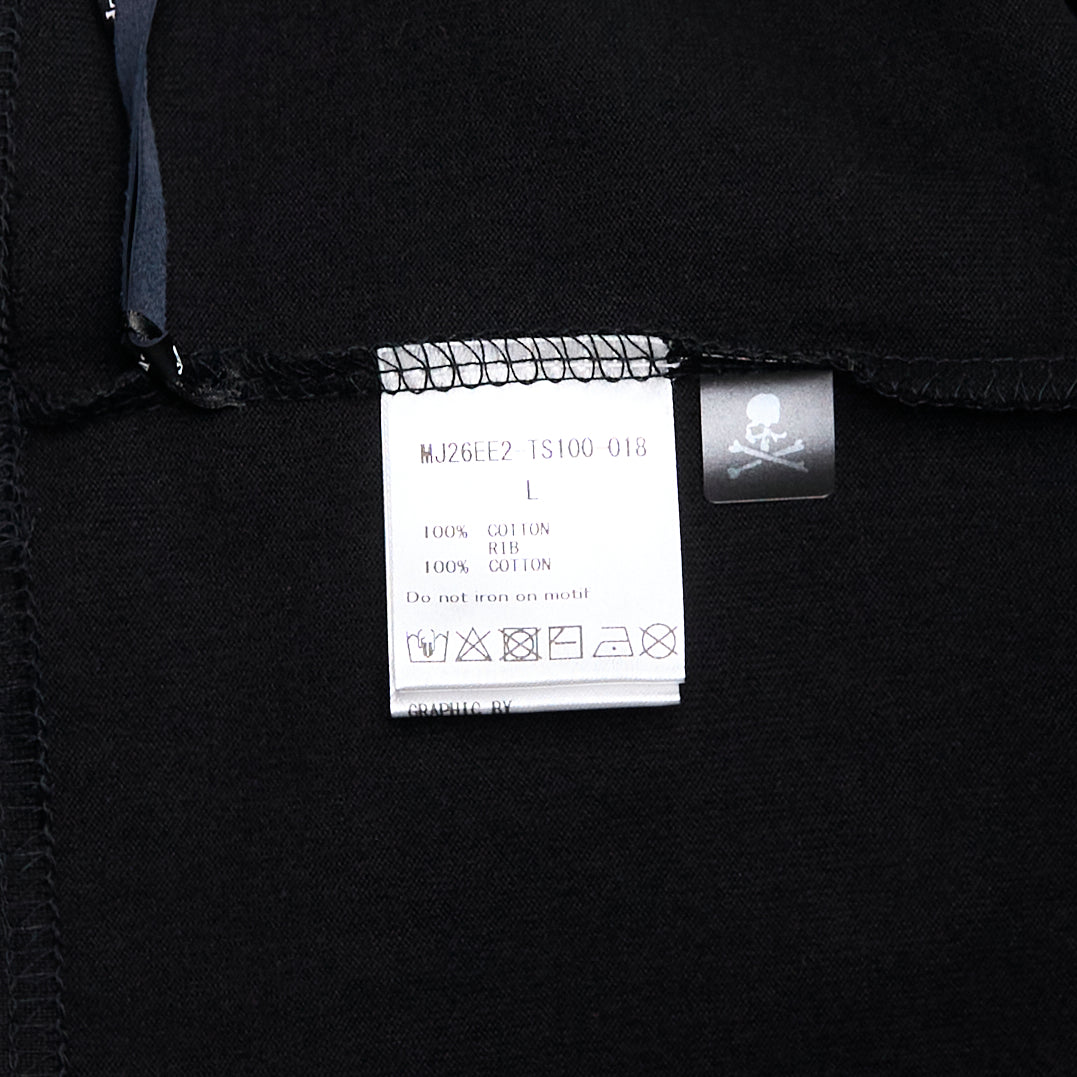 Mastermind Japan OG Boxy Long Sleeve Tee in black with embroidered arched logo and skull-and-crossbones motifs across the chest