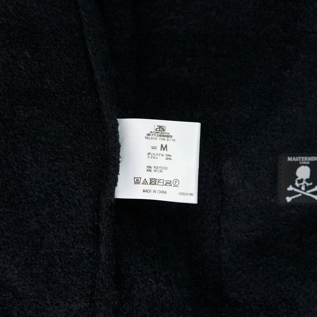 Mastermind Lounge Zip-Up Hoodie in dark navy bouclé knit with full zip closure, fixed hood, and front kangaroo pocket