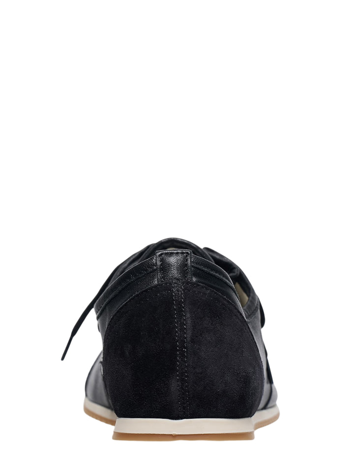 Lemaire Gummy Grip Mix Napp Sneaker in black pebbled leather and suede with white midsole and gum rubber outsole, side profile view - view 3