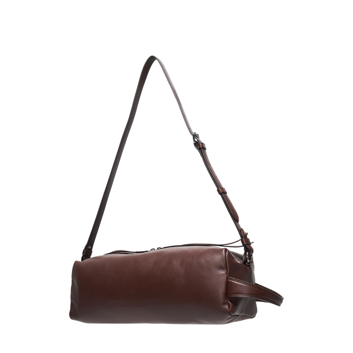 Lemaire Care Sling Bag in dark brown nappa lambskin with adjustable crossbody strap and zip closure, front view on white background