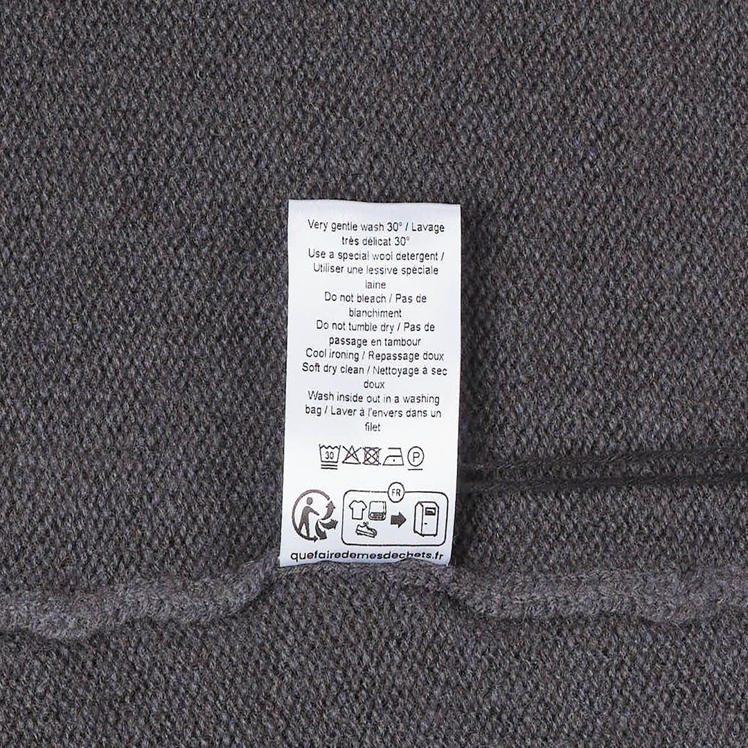 Lemaire Cashmere V-Neck Sweater in charcoal grey, featuring a ribbed V-neckline, ribbed cuffs and hem, photographed flat on a white background