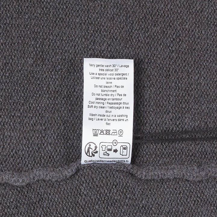 Lemaire Cashmere V-Neck Sweater in charcoal grey, featuring a ribbed V-neckline, ribbed cuffs and hem, photographed flat on a white background