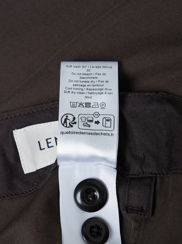 Lemaire tapered pants in heavy cotton with adjustable side waist tabs and button fly, shown from the front - view 3