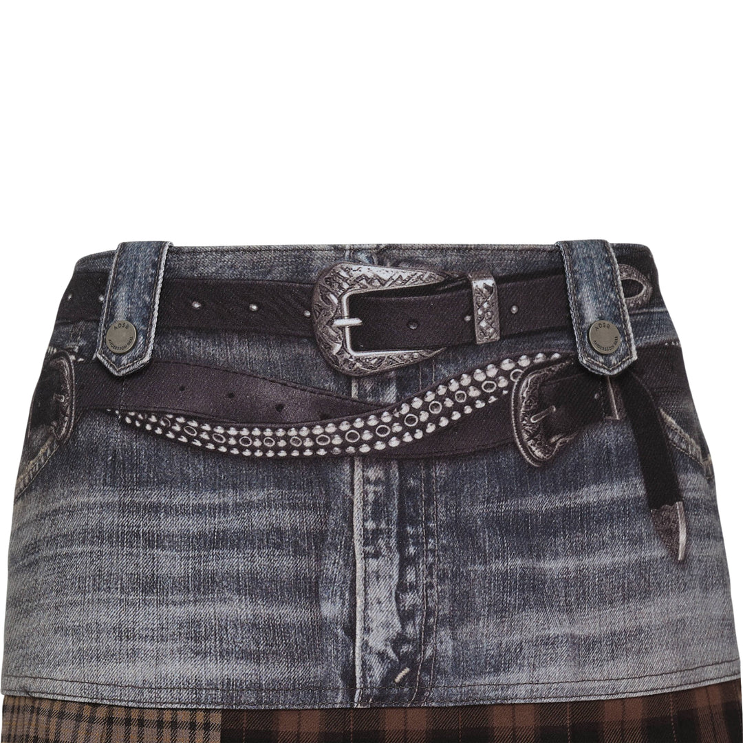 Andersson Bell Double Belt Printed Mini Skirt featuring a printed washed-denim upper panel with rhinestone double belt detail and an asymmetric mixed brown tartan pleated hem, photographed flat on a white background