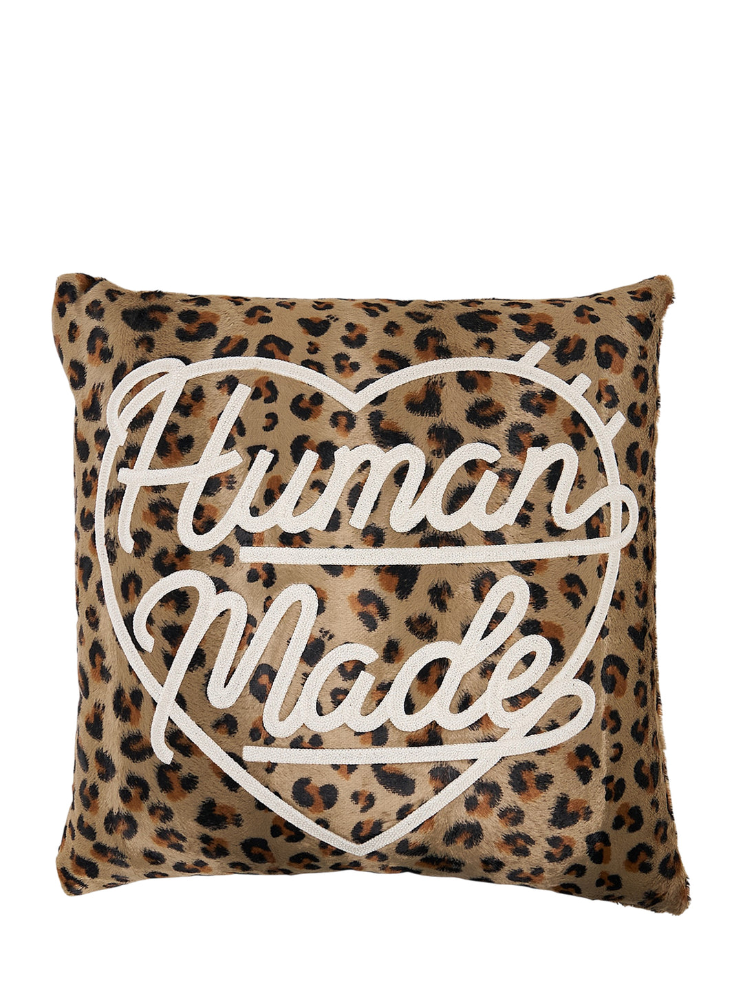 Square leopard-print cushion with cream embroidered Human Made script logo inside a heart outline