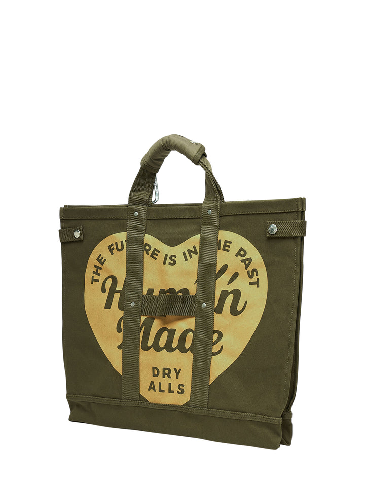 Human Made large olive green canvas tote bag with padded handles, silver carabiner clip, snap-button side tabs and red heart logo patch - view 2