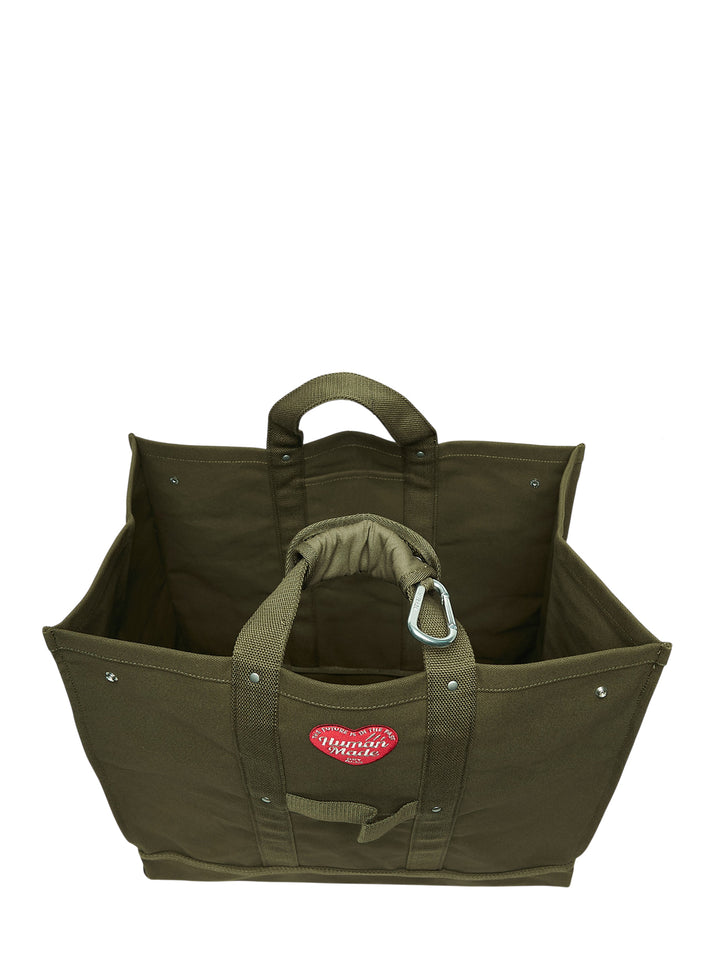 Human Made large olive green canvas tote bag with padded handles, silver carabiner clip, snap-button side tabs and red heart logo patch - view 3