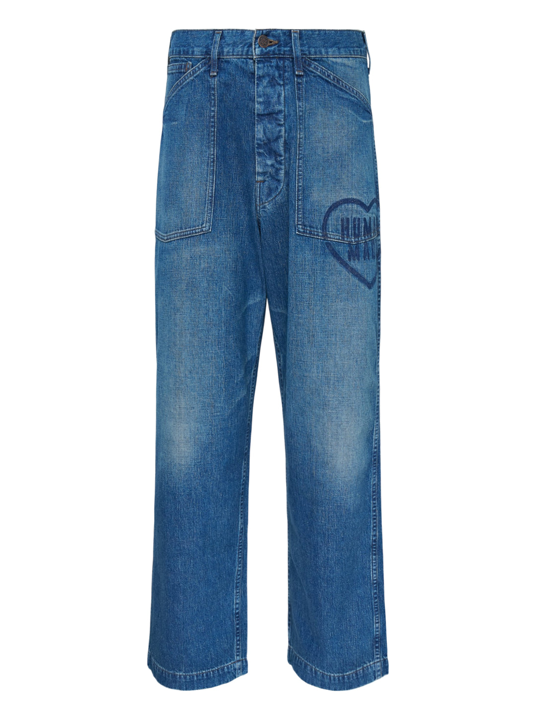Human Made baggy denim pants in washed mid-blue with oversized patch pockets and a heart logo print on the leg, shown from the front