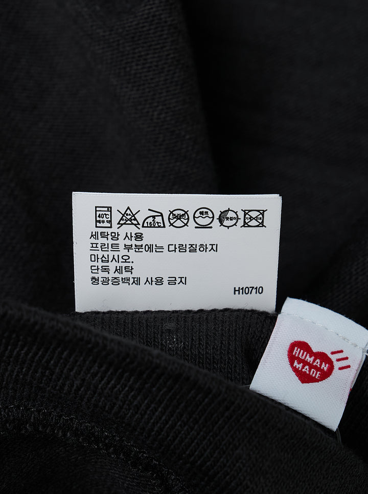 Human Made black short sleeve crew neck t-shirt with a large red hand-drawn heart graphic and 'Human Made' bubble lettering on the chest - view 4
