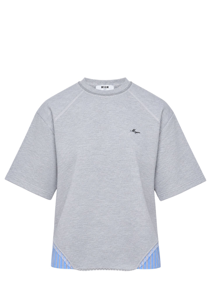 MSGM grey marl short sleeve T-shirt with blue striped fabric inserts at the hem, lace trim at the neckline, and embroidered MSGM script logo at the chest