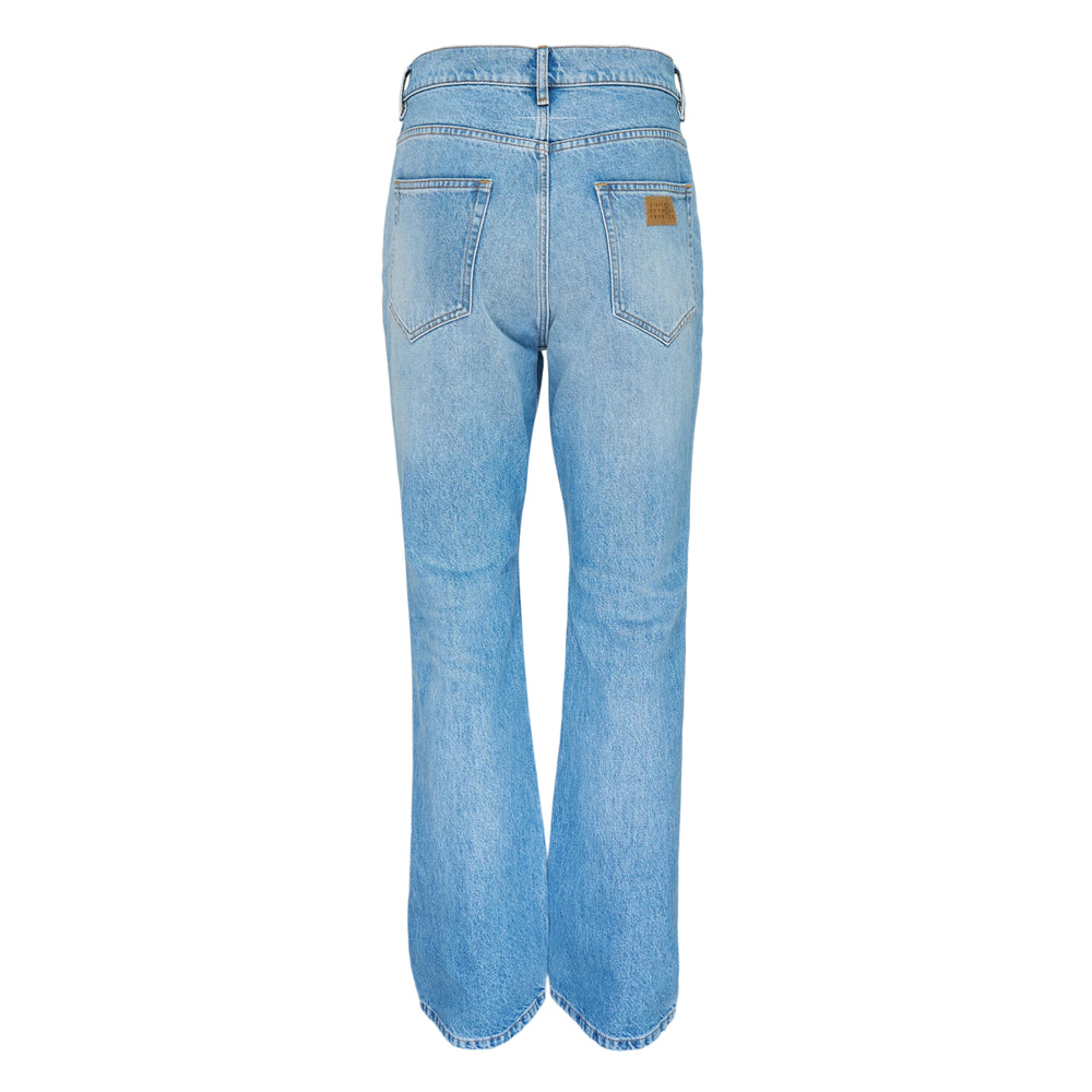 MM6 5 Pocket Blue Denim Jeans in light wash, featuring a high rise, natural whiskering, and a straight-to-flare leg silhouette