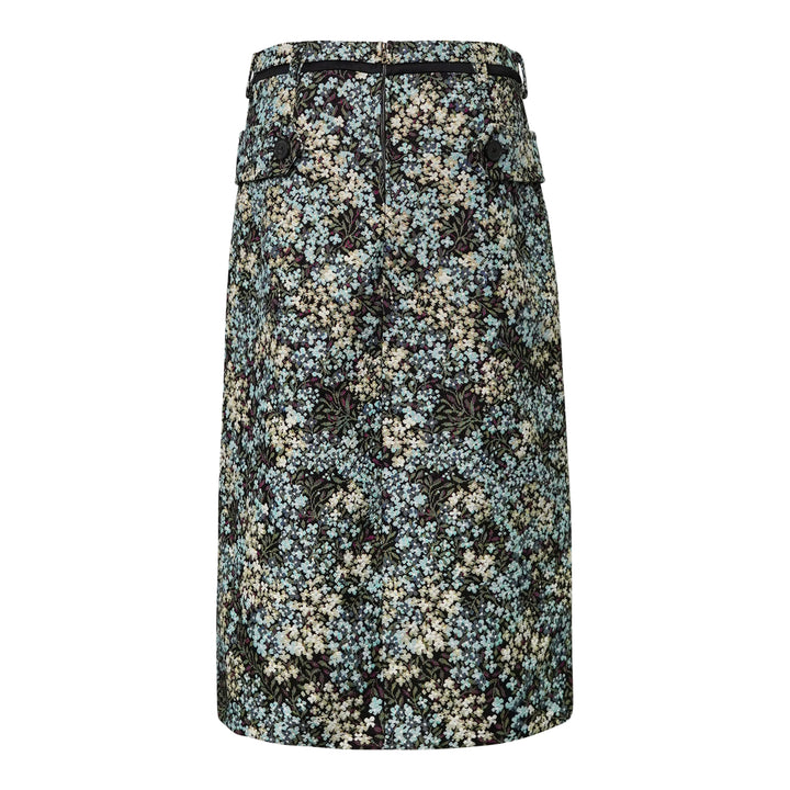 Dries Van Noten floral jacquard straight midi skirt with double-breasted button placket, flap pockets, belt loops with contrast ribbon belt, and front hem pleats, displayed flat on a white background - view 2