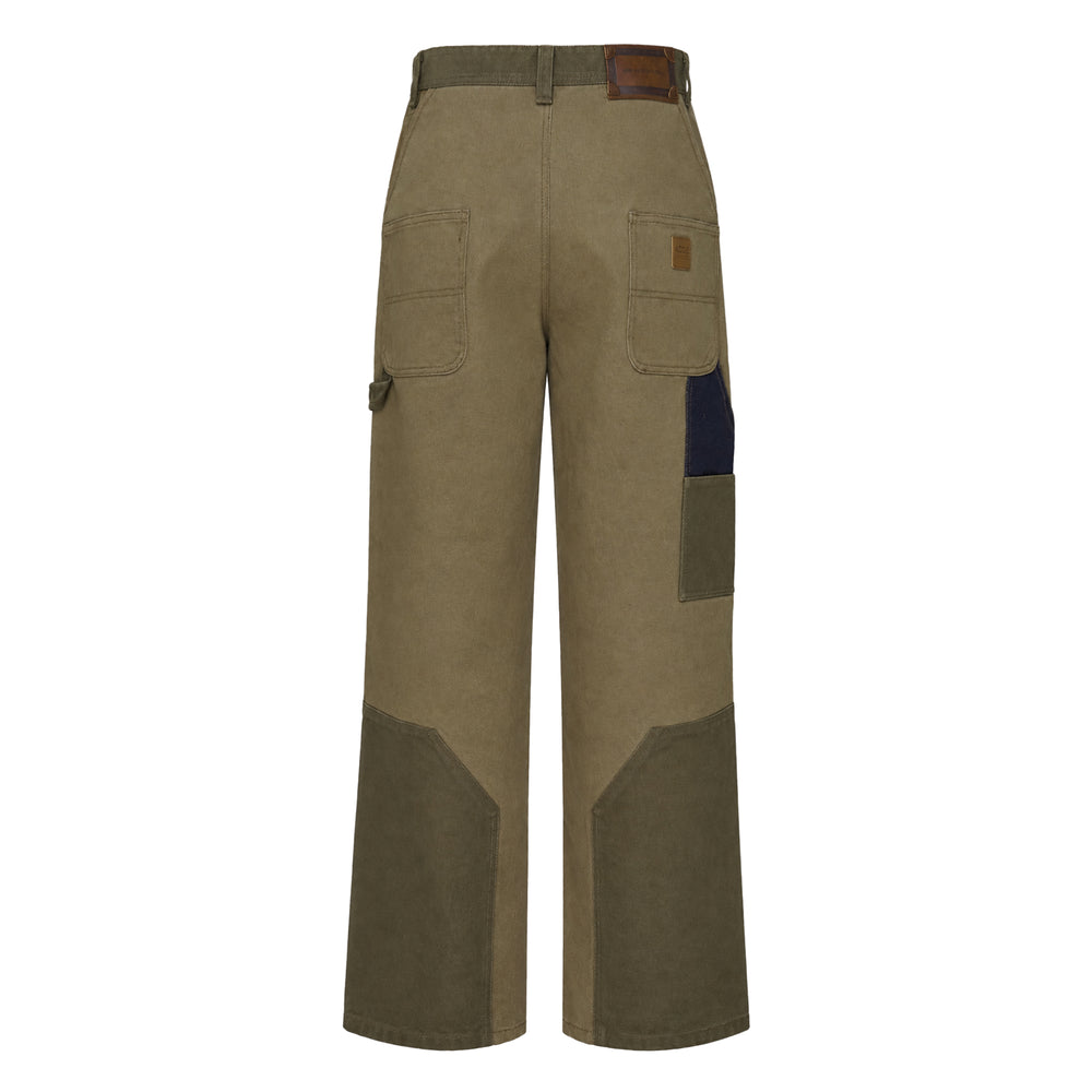 Andersson Bell Austin Patchwork Wide-Leg Jeans in tonal olive with contrast dark denim waistband, large front patch pockets, and curved knee-panel detailing — front view