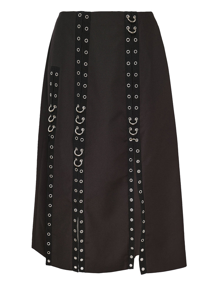 Simone Rocha black midi skirt with vertical grommet-trimmed straps, silver ring hardware and front slits