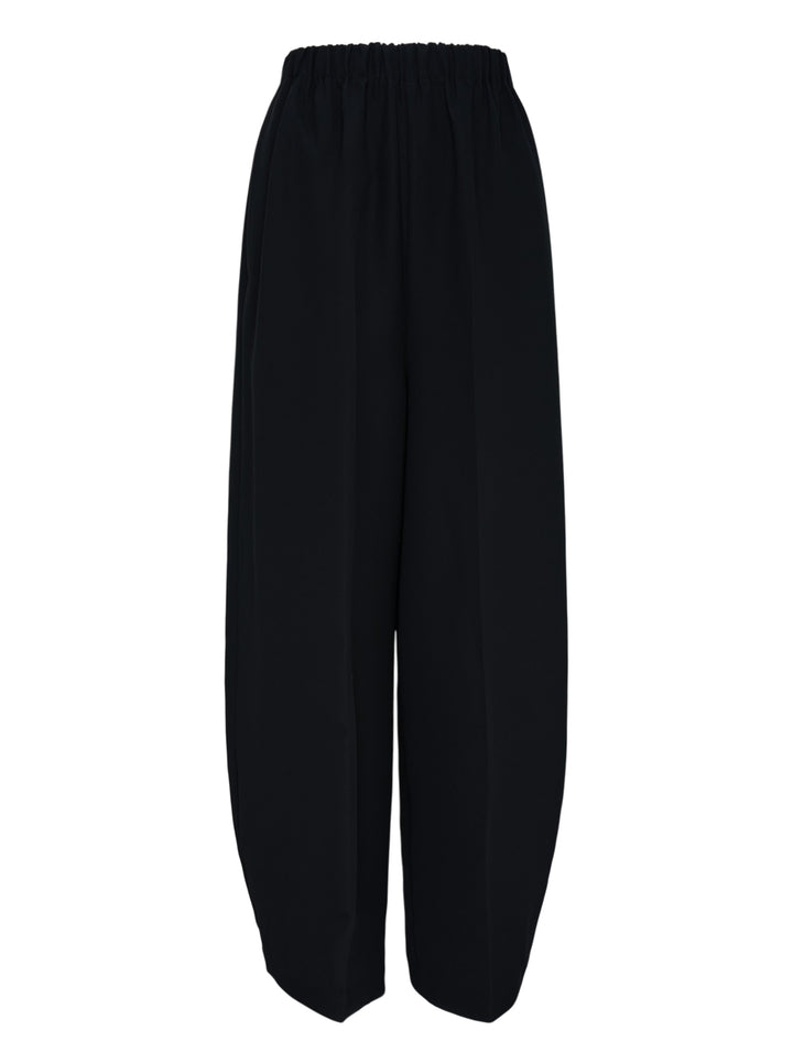 Enfold Straight Cocoon Pants in black — voluminous wide-leg silhouette with gathered elasticated waistband and tapered hem, front view on white background