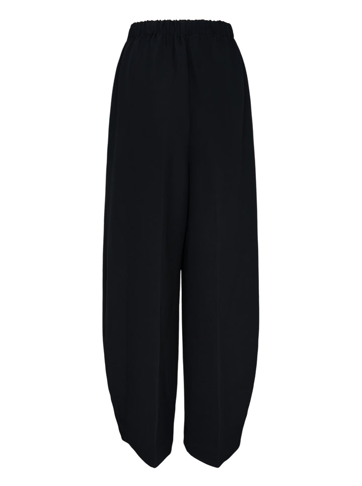 Enfold Straight Cocoon Pants in black — voluminous wide-leg silhouette with gathered elasticated waistband and tapered hem, front view on white background - view 2