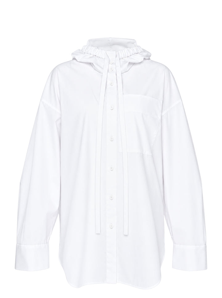 Enfold white oversized hooded button-up shirt with elasticated gathered hood, tonal buttons, long drawstring ties, and a single chest patch pocket