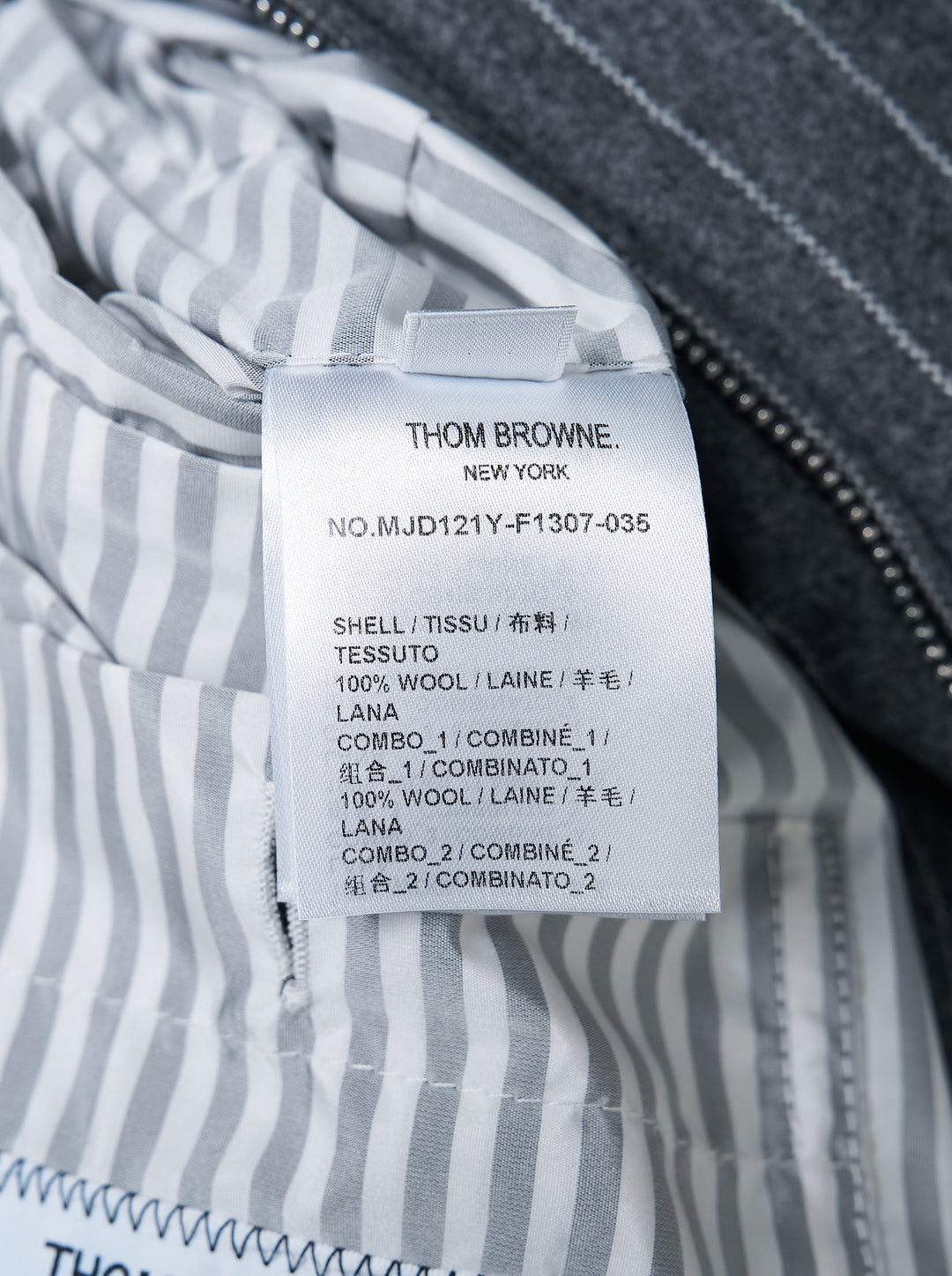 Thom Browne down-filled zip front puffer jacket in patchwork grey flannel and pinstripe with black ribbed knit collar and cuffs - view 3