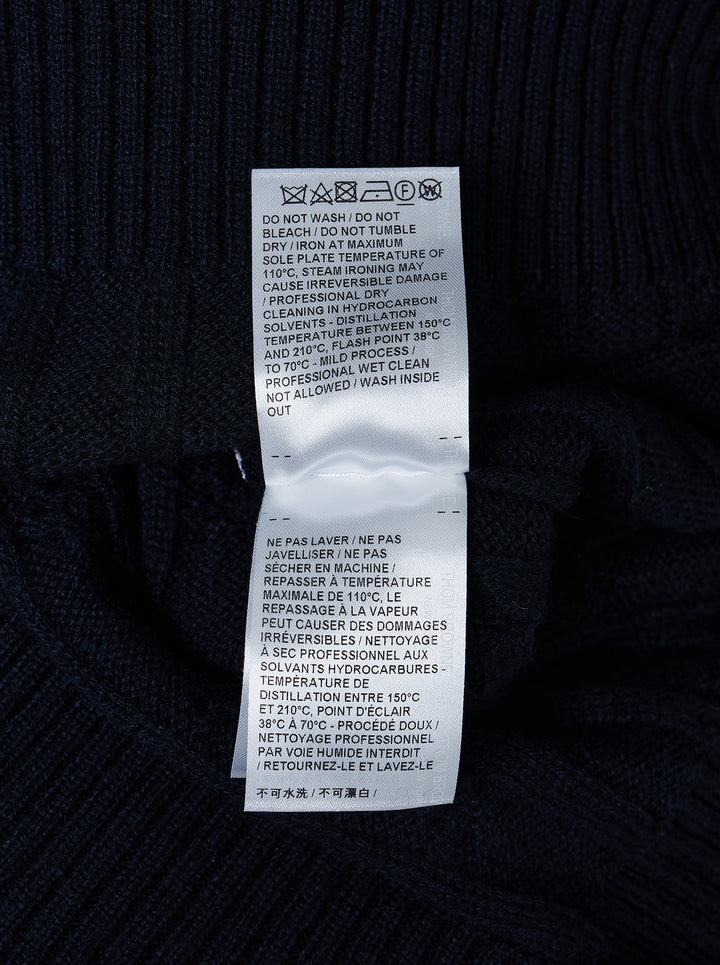 Thom Browne navy cable-knit relaxed fit V-neck sweater with white 4-bar stripe on the sleeve - view 3