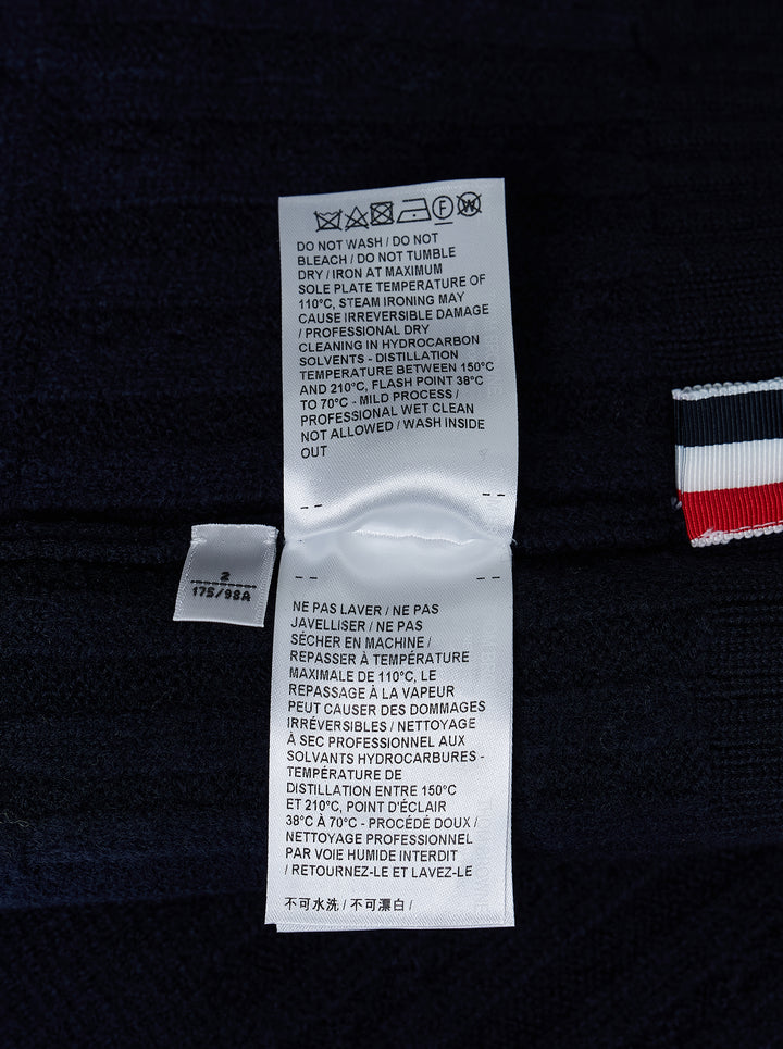 Thom Browne navy V-neck cardigan with cable and Milano stitch panels, white grosgrain trim and signature 4-bar stripe on the sleeve - view 4