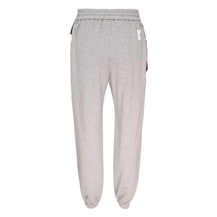 pushBUTTON black faux-leather mini skirt overlay layered over grey marl tapered sweatpants with elasticated cuffs and silver rivet hardware - view 2