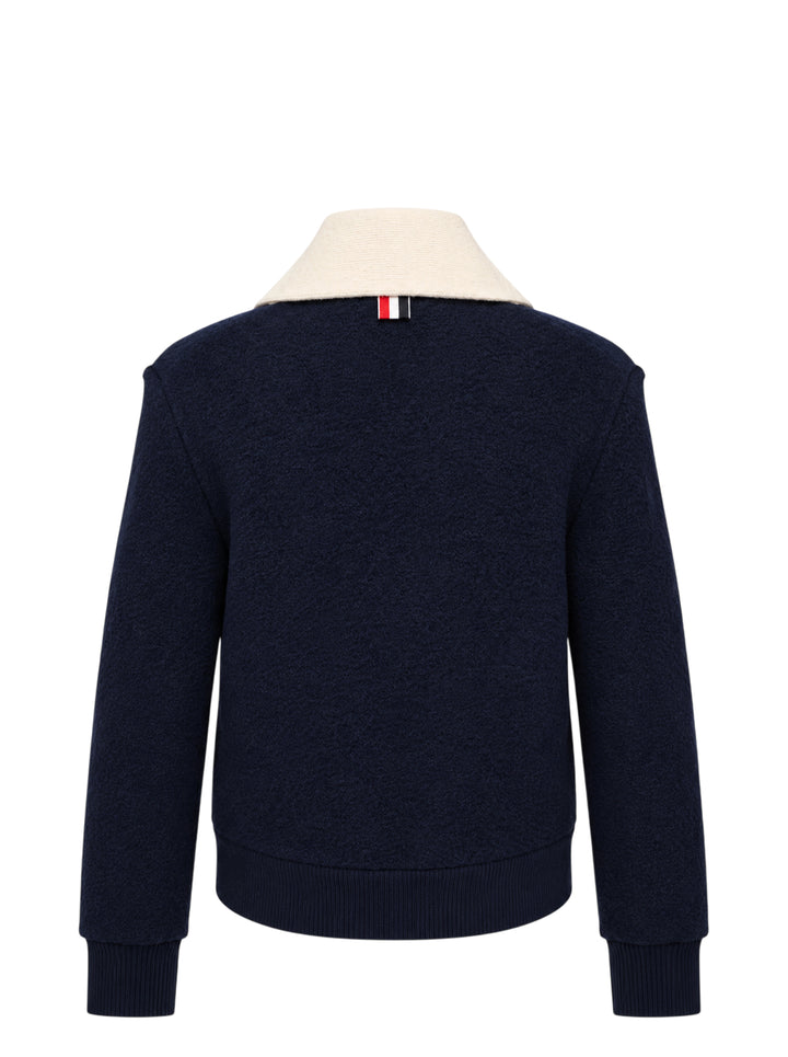 Thom Browne navy wool cardigan jacket with cream ribbed shawl collar, contrast button placket and woven label at the hem - view 2